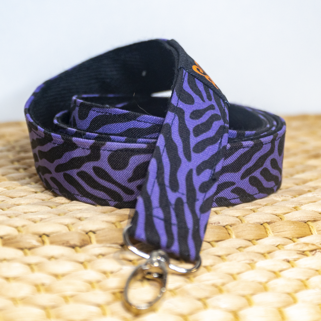 CINTA PORTA MÓVIL CEBRA MORADO